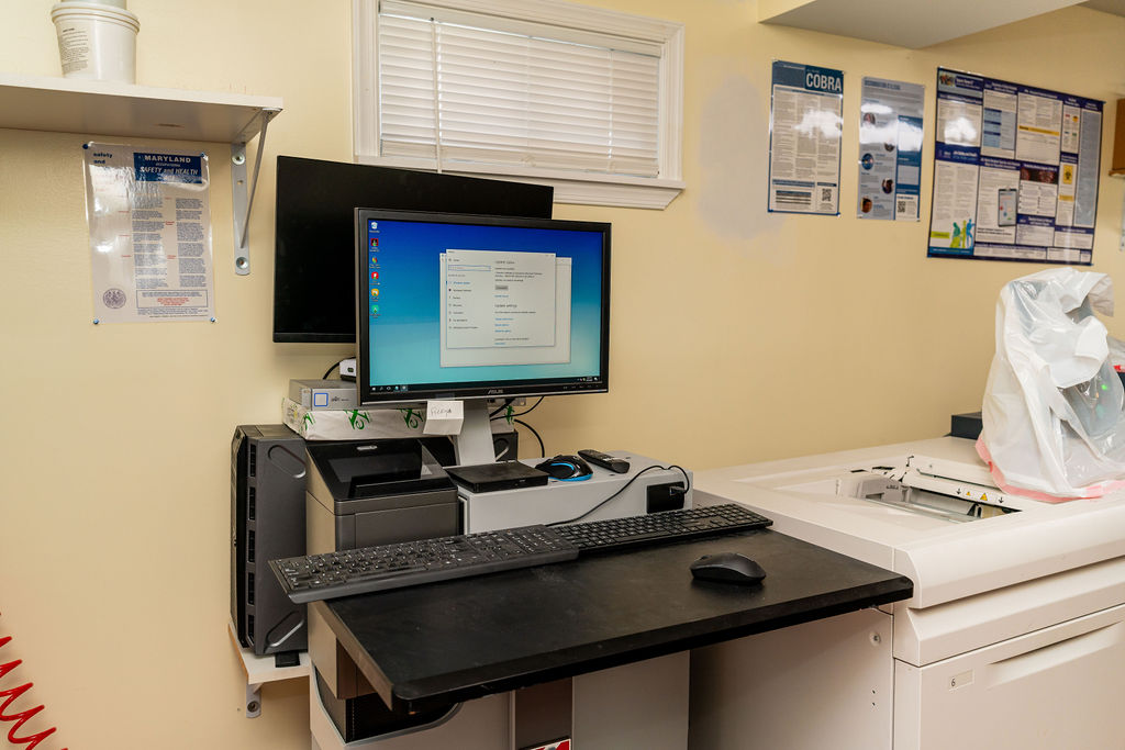 Graphic design workstation where Hilson Ink prepares artwork and proofs — Window Graphics